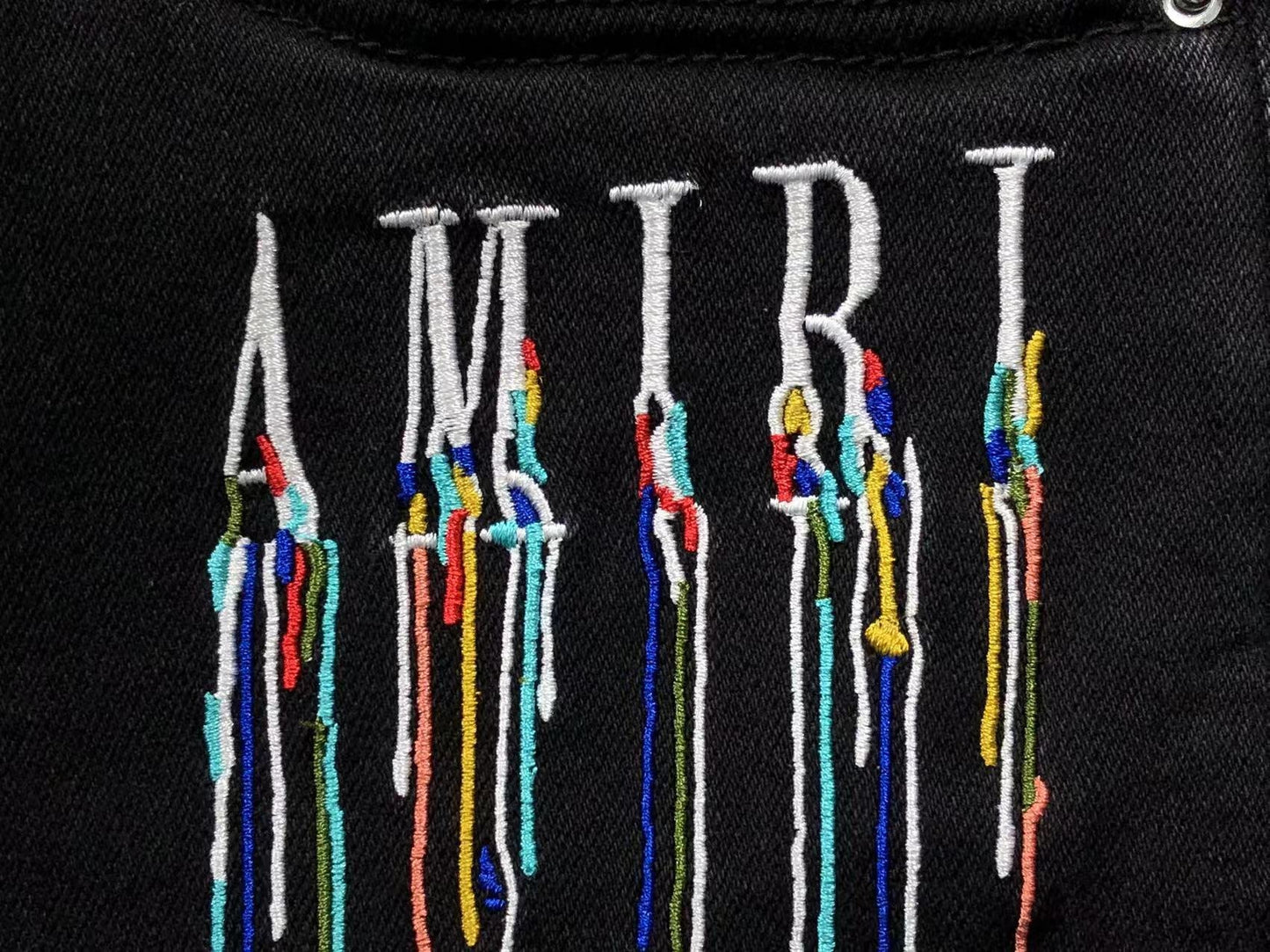 Calça AMIRI Paint Drip Light Wash