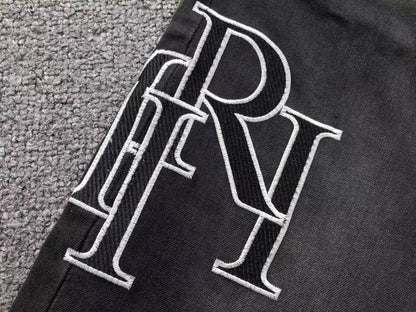 Calça AMIRI Logo Paint Splatter Black Denim