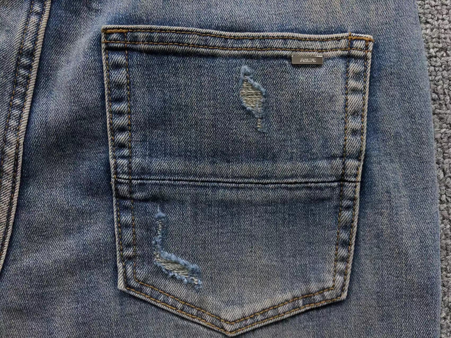 Calça AMIRI Vintage Logo Washed Denim