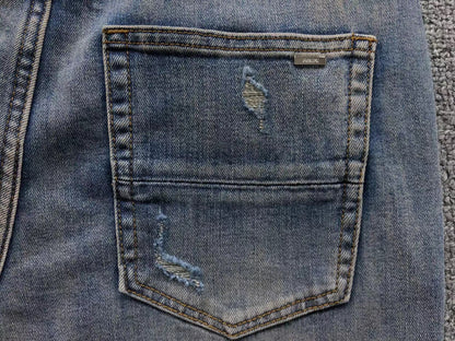 Calça AMIRI Vintage Logo Washed Denim