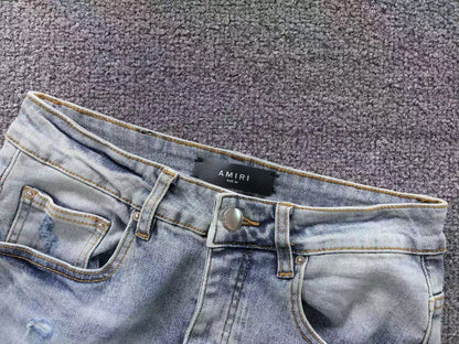 Calça AMIRI Ice Destroyed Paint Denim