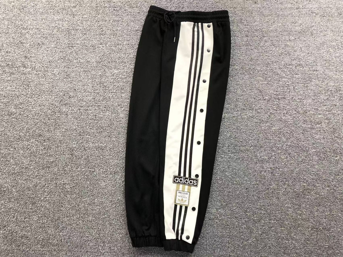 Calça Adidas Snap Track Pants