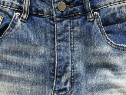 Calça AMIRI Light Wash Destroyed Denim