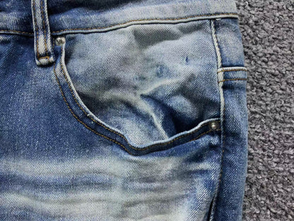 Calça AMIRI Vintage Destroyed Logo Denim (Ice Wash)