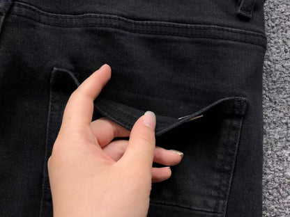 Calça AMIRI Bullet Hole Patch Black Denim