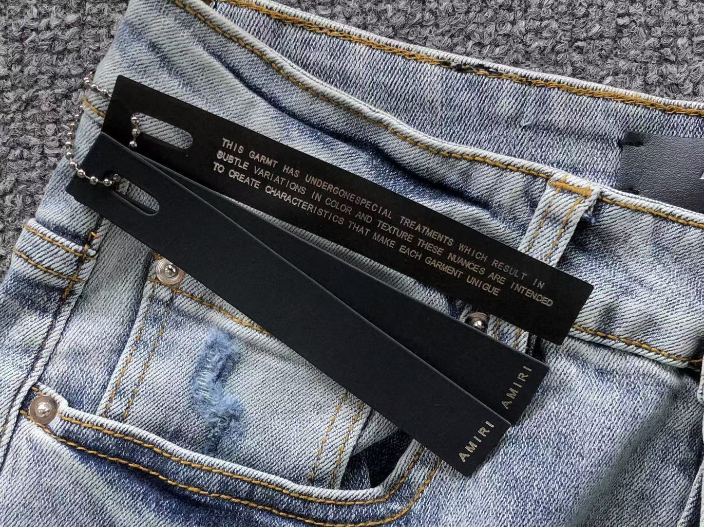 Calça AMIRI Ice Destroyed Paint Denim