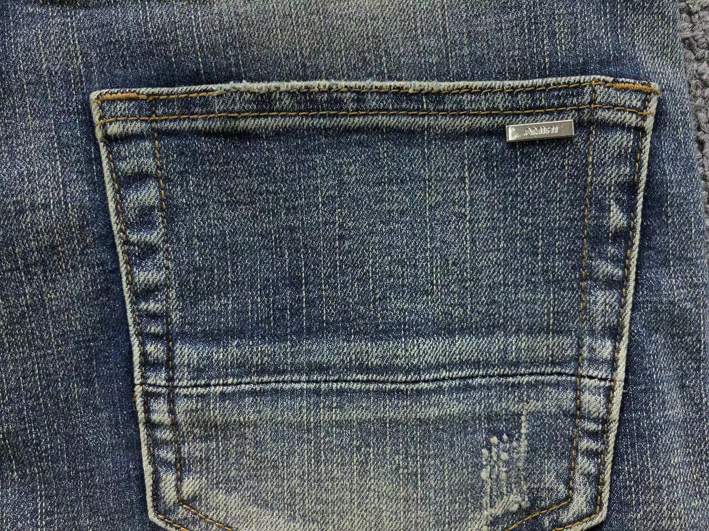 Calça AMIRI Vintage Blue Ribbed Destroyed Denim