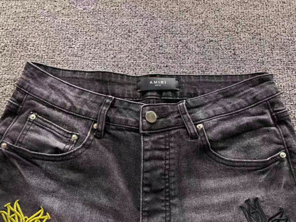Calça AMIRI Multi Patch Black Destroyed Denim