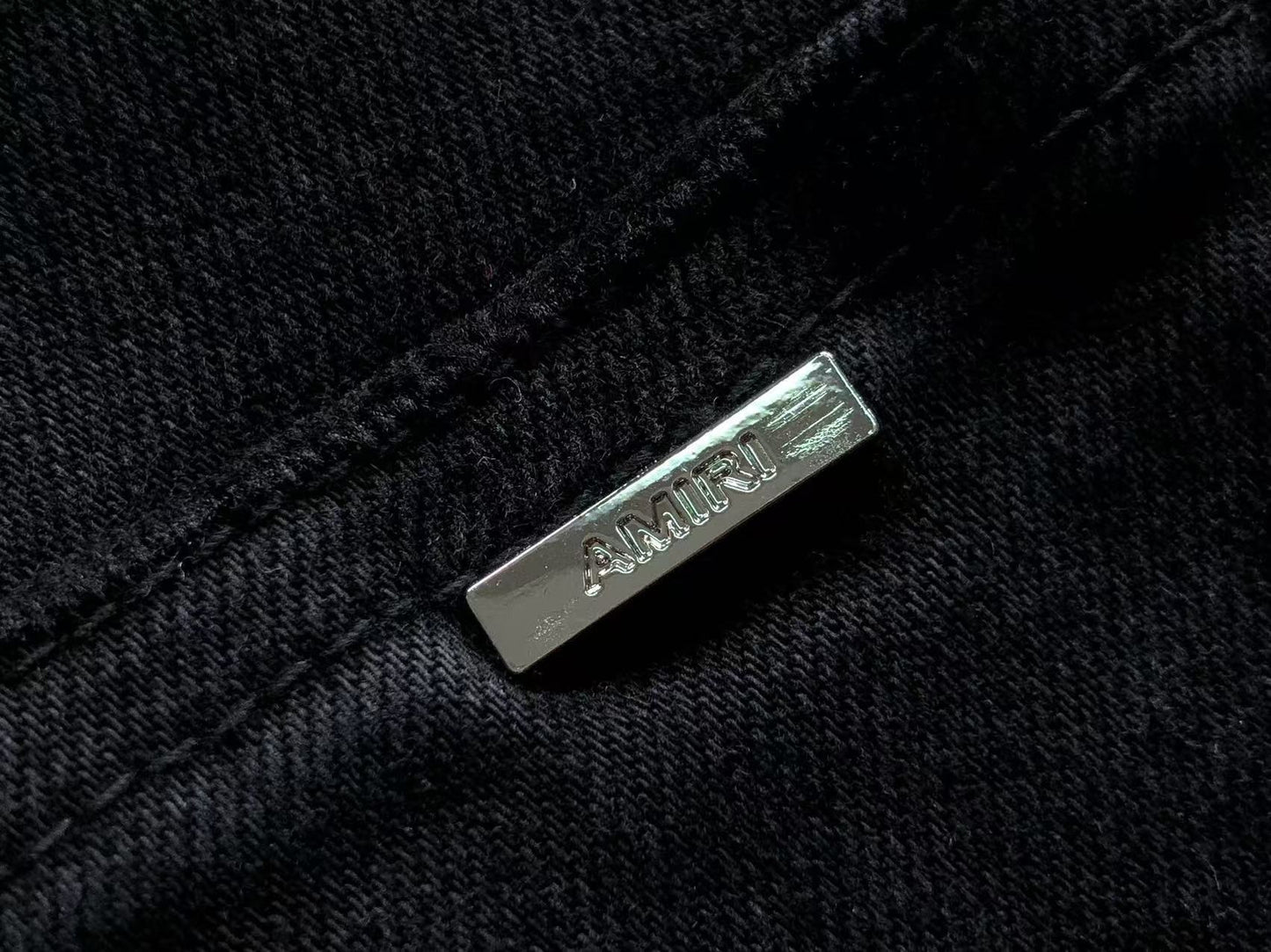 Calça AMIRI Bullet Hole Patch Black Denim