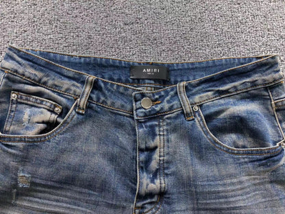 Calça AMIRI Vintage Logo Washed Denim
