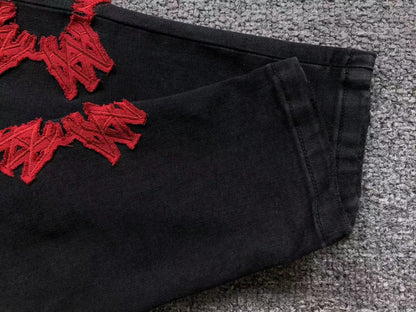 Calça AMIRI Bullet Hole Patch Black Denim