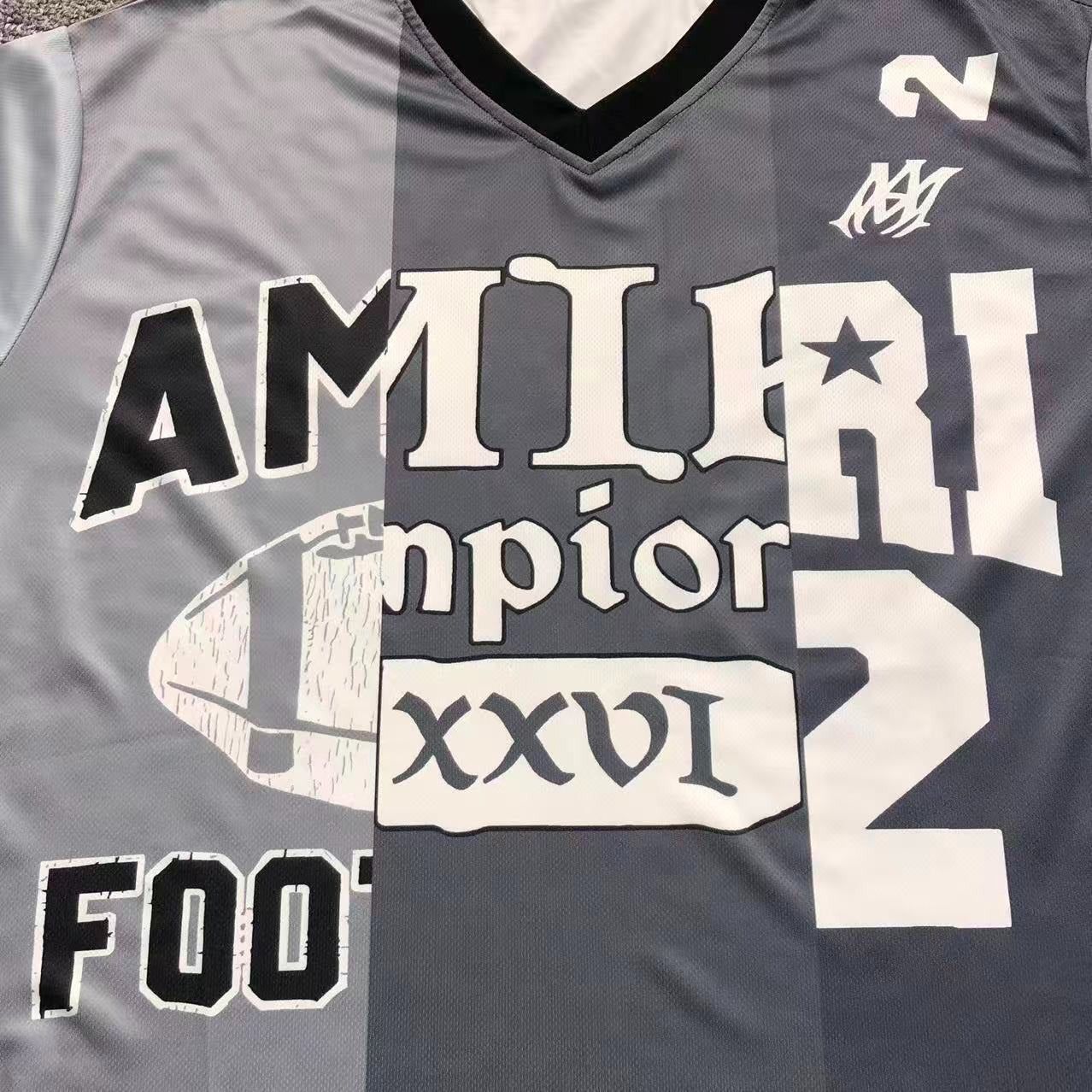 Camiseta AMIRI Champion XXVI Varsit