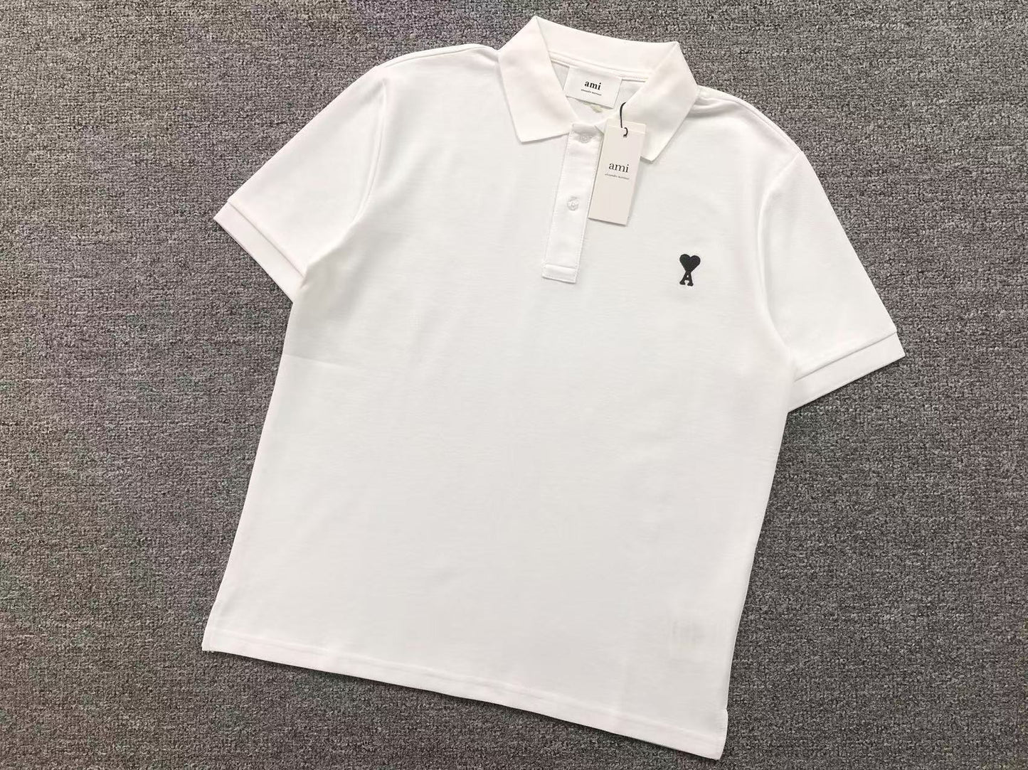 Camiseta Polo AMI Paris Piquet Logo Coração