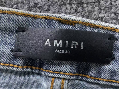 Calça AMIRI Ice Destroyed Paint Denim