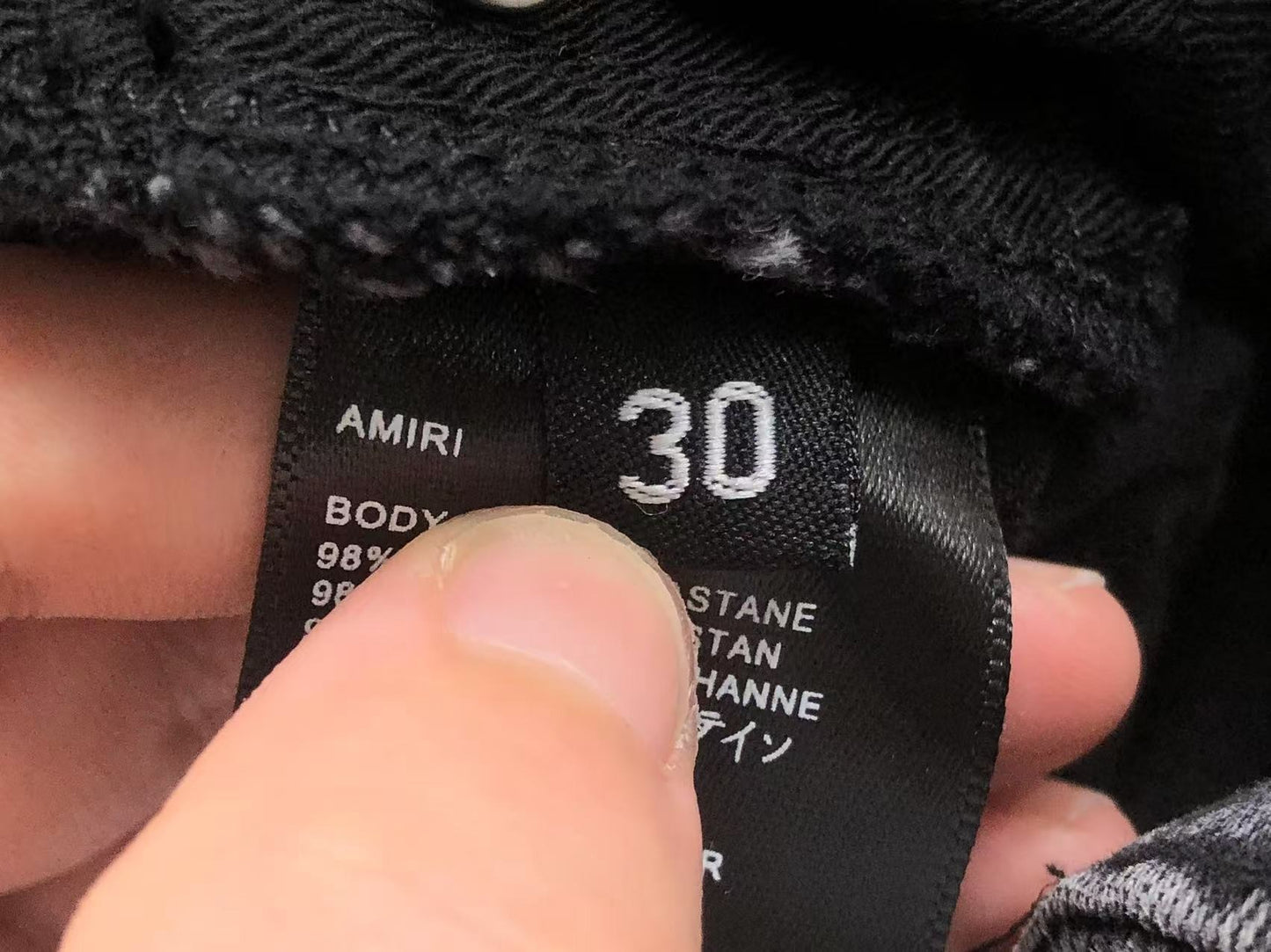 Calça AMIRI Black Paint Wash Denim