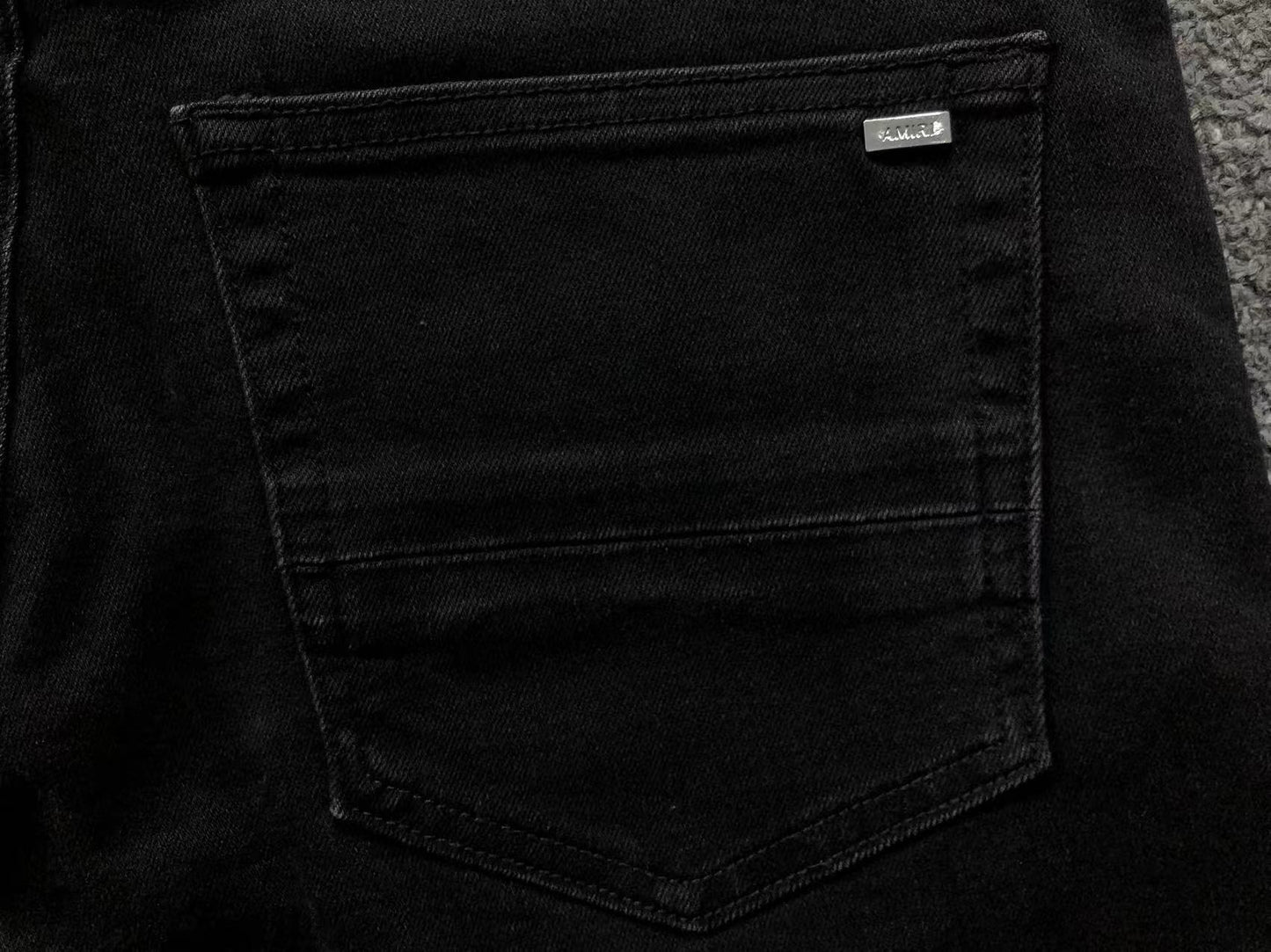 Calça AMIRI Paint Drip Light Wash