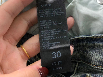 Calça AMIRI Vintage Blue Ribbed Destroyed Denim