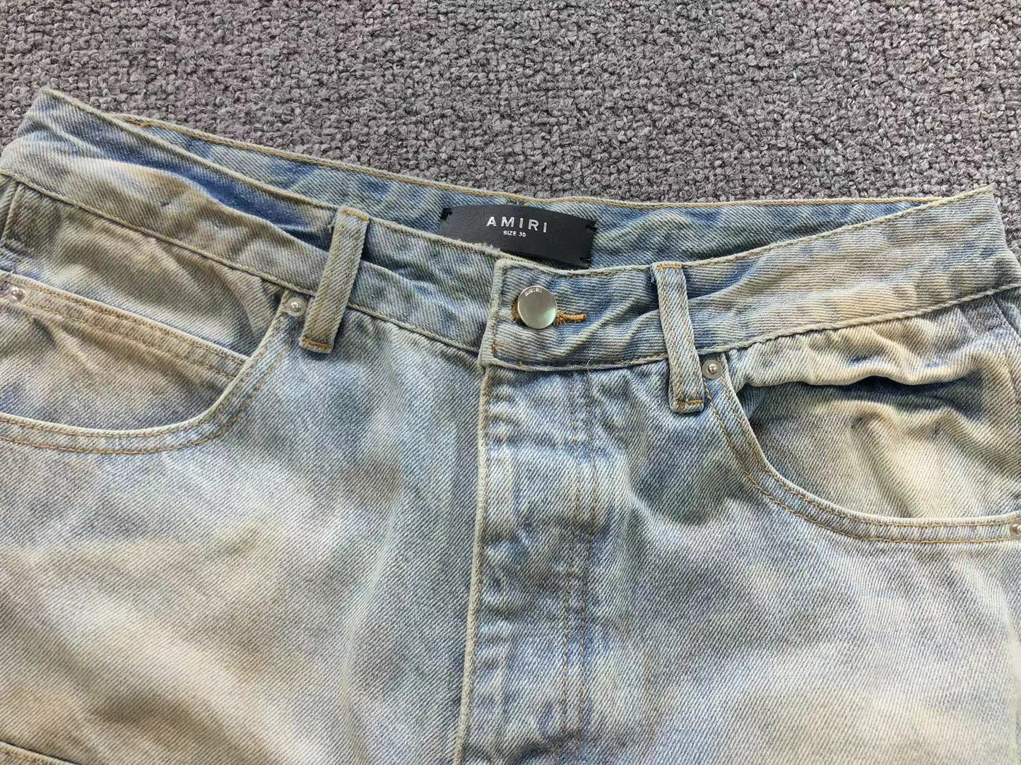 Calça AMIRI Dirty Wash Carpenter Jeans