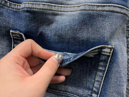 Calça AMIRI Vintage Destroyed Logo Denim (Ice Wash)