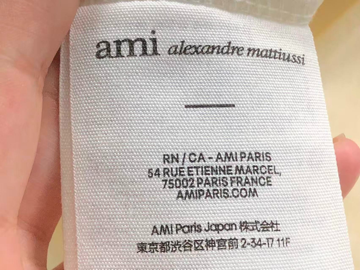 Camiseta AMI Paris Raglan Logo Coração