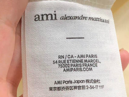 Camiseta AMI Paris Raglan Logo Coração