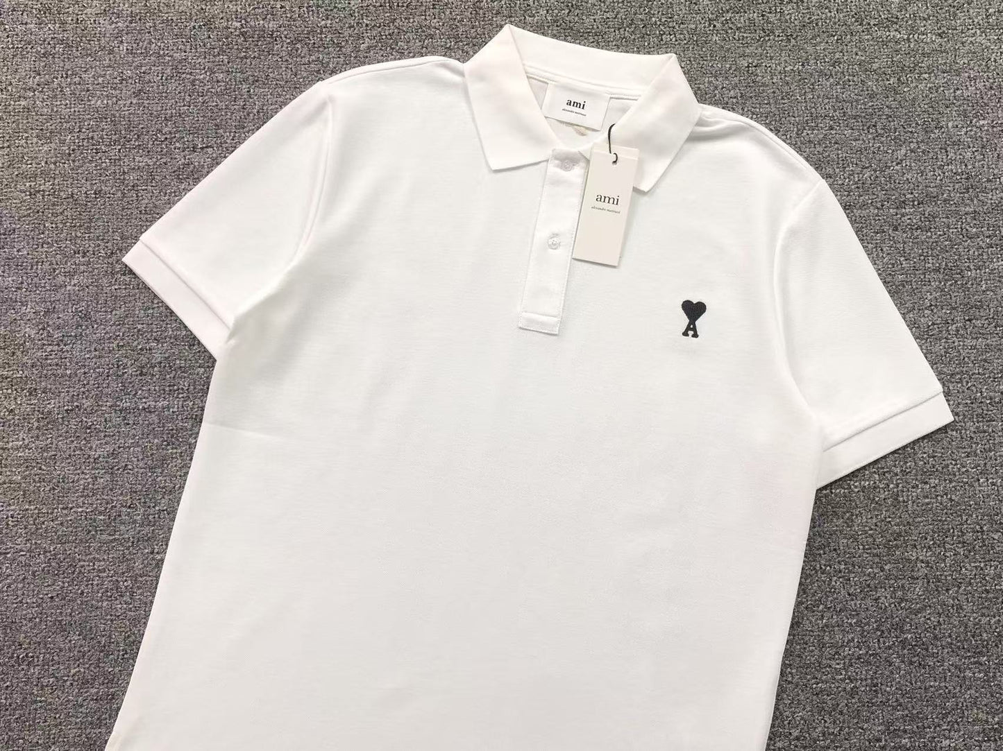 Camiseta Polo AMI Paris Piquet Logo Coração